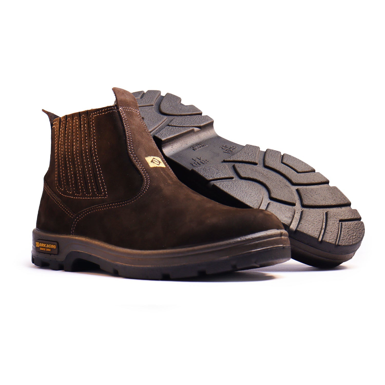 Botas marrons estilo Chelsea com sola antiderrapante preta e costura visível