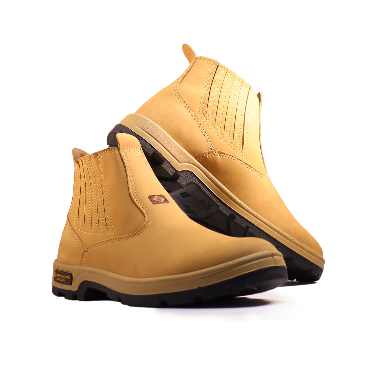 Botas masculinas amarelas estilo Chelsea com sola preta antiderrapante em fundo branco